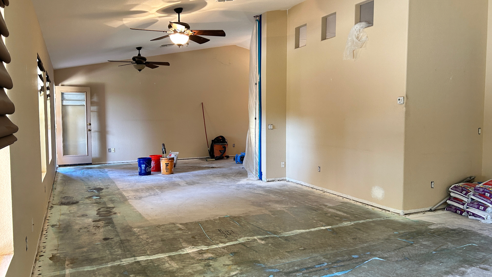 An HPM Flooring project space ready for scheduled installation